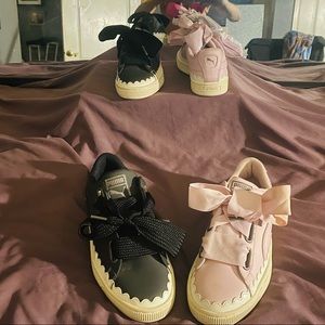 Two pairs of Pumas one pink one black size 6